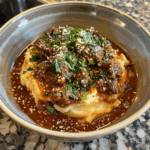 Tender Short Rib Ragu Over Silky Parmesan Mashed Potatoes